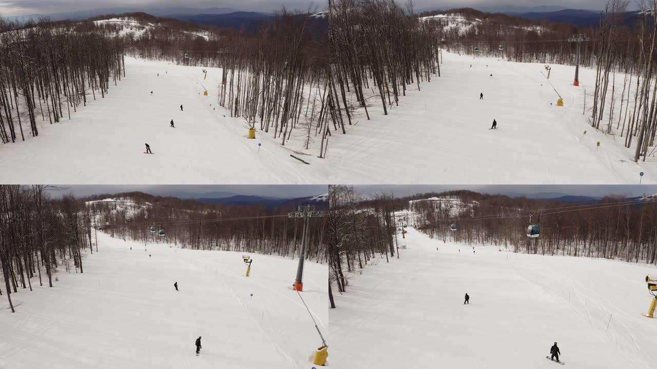冬季滑雪场、滑雪缆车和滑雪坡上的人股票视频...