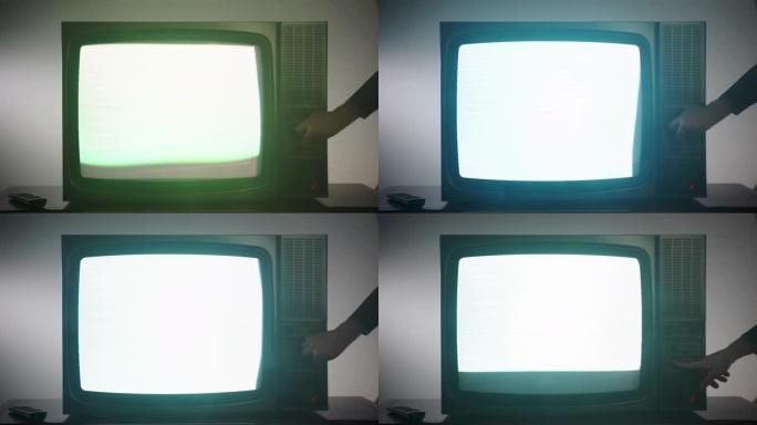 老式电视在黑暗的废弃房间，闪烁的白屏，噪音干扰和划痕。电视仪表板上的男性换手频道，90年代的电视坏了