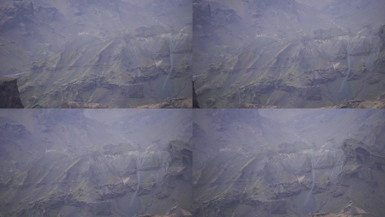 具有不同颜色层的峡谷悬崖和丘陵