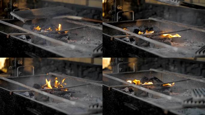 烤架上闷烧木头火素材烧烤架拍摄