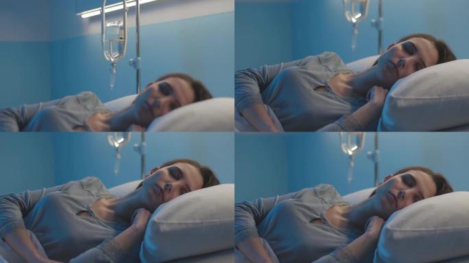 女人躺在病床上接受静脉注射治疗