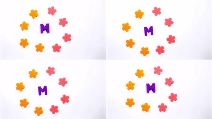 英语字母表的蓝色移动字母M。白色背景上的舞蹈字母。