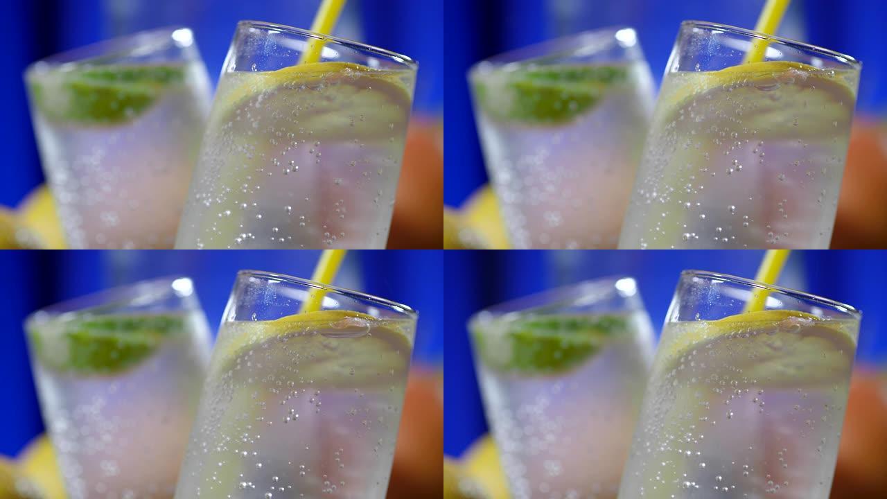 柑橘类水果注入水玻璃杯特写展示饮水饮料
