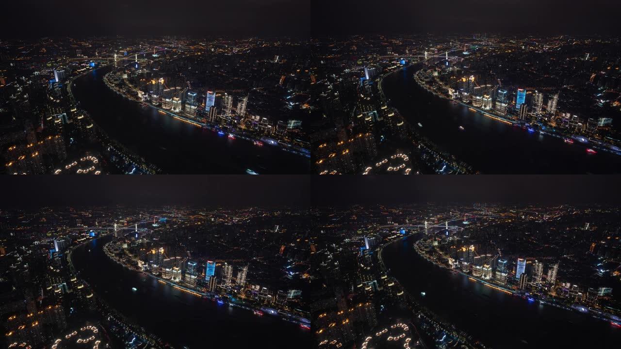 4k延时: 中国上海黄浦江上照明观光游轮的鸟瞰图