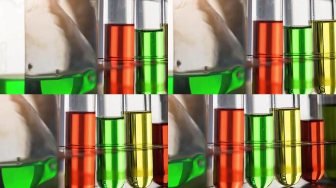 试管的平移镜头包含实验室玻璃器皿背景的化学液体。实验室研发理念。