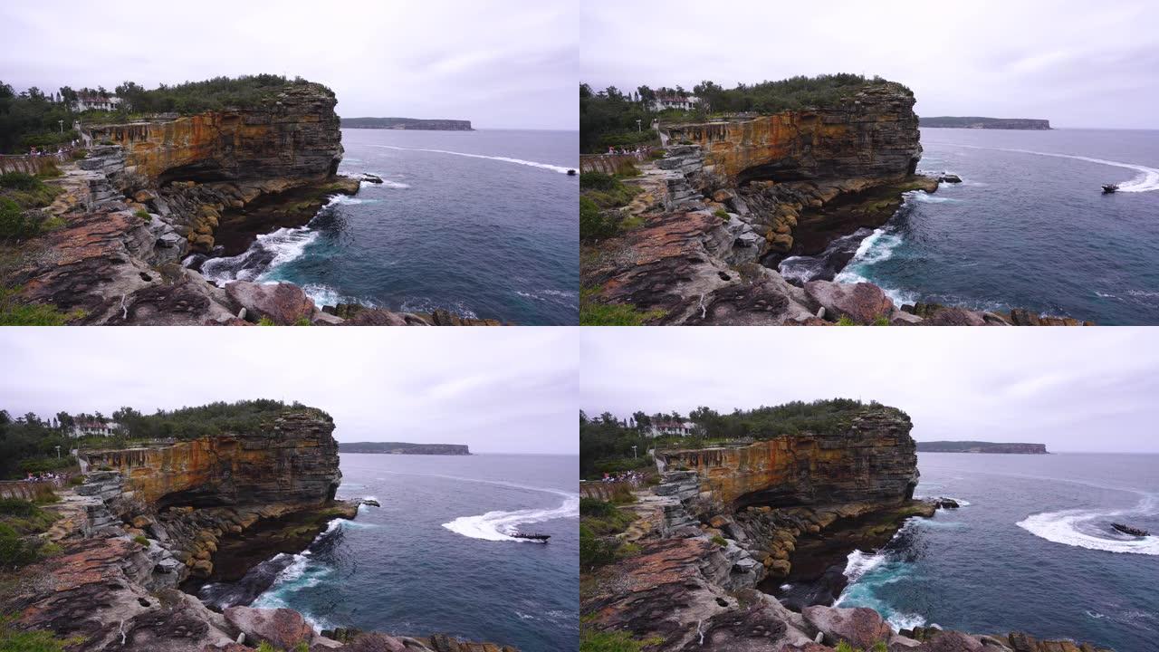 澳大利亚悉尼屈臣氏湾悬崖与快艇的差距