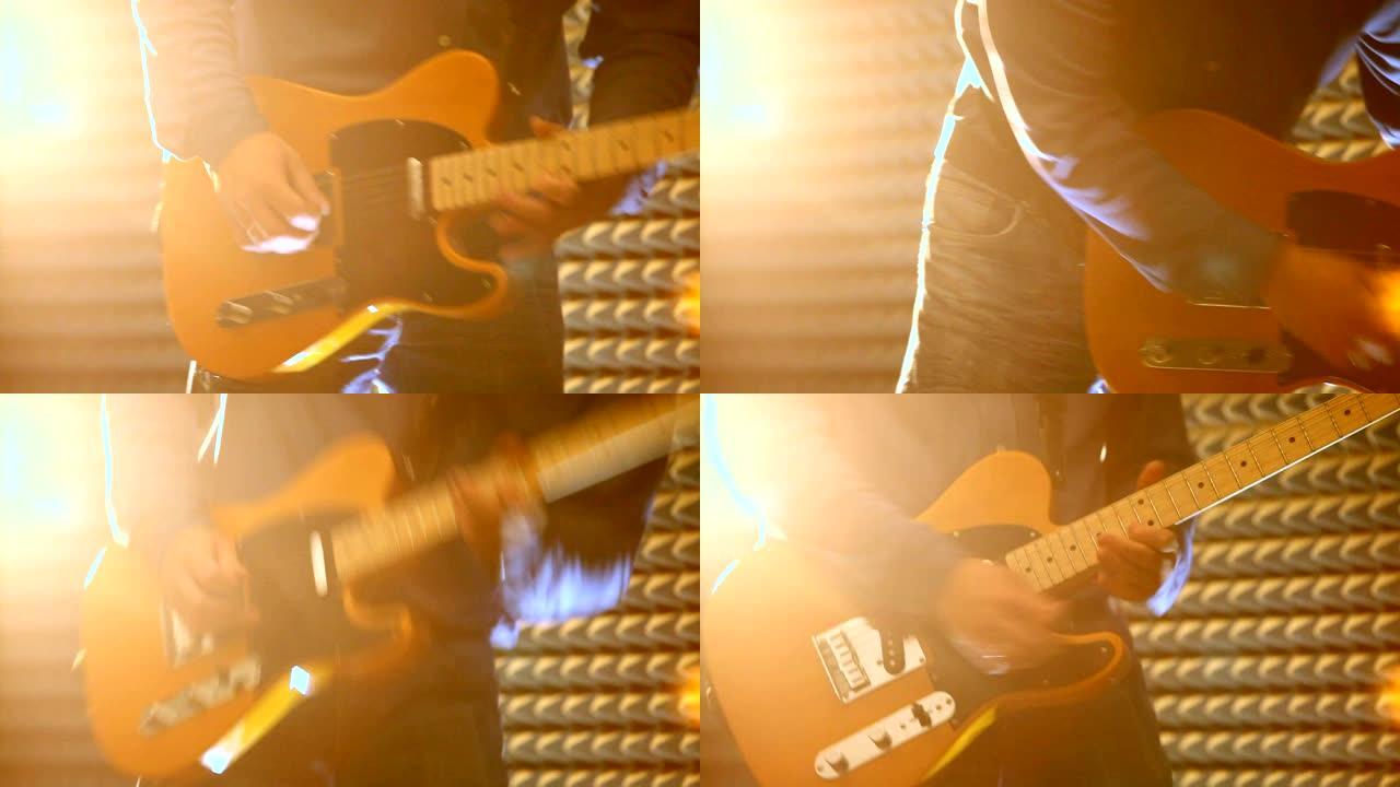 穿着牛仔裤的年轻人在明亮的背光特写镜头中弹吉他