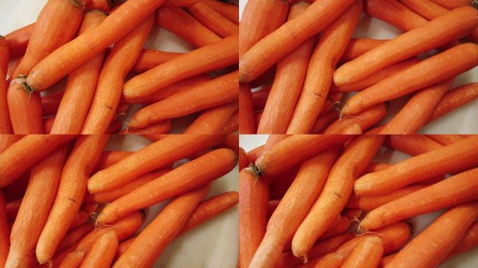 商业厨房里的一堆胡萝卜