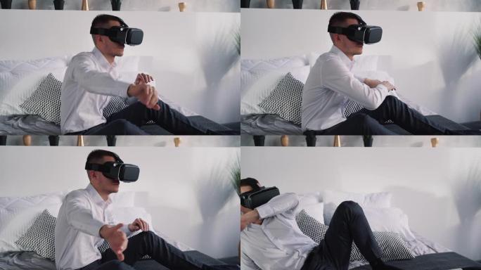 迷人的男人在虚拟现实头盔上玩游戏