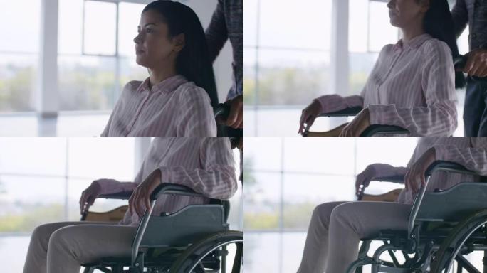 坐在轮椅上的年轻瘫痪女孩