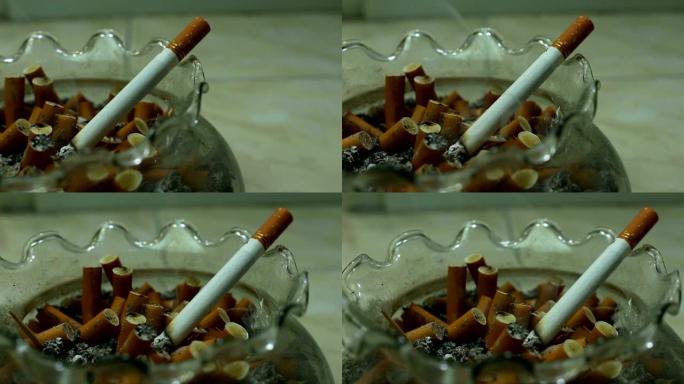 烟灰缸中的香烟燃烧多莉射击