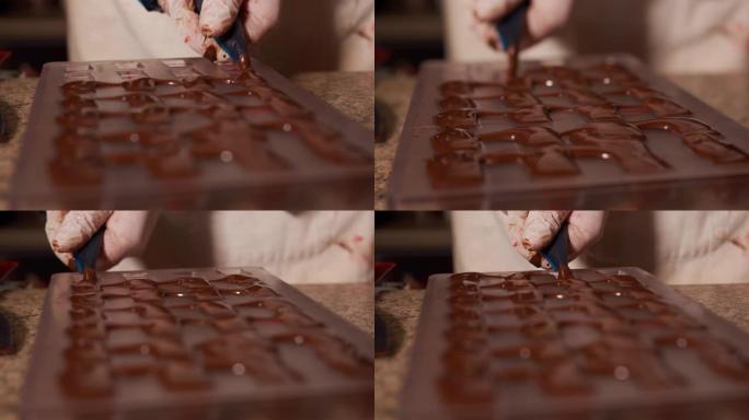 将巧克力放入模具中，制成果仁糖