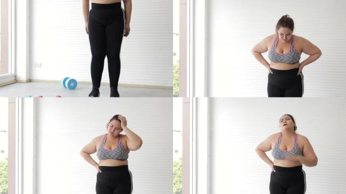 年轻女性在健身房检查体重的秤上称重后，体重增加的压力很大。加大码肥胖成熟女性概念