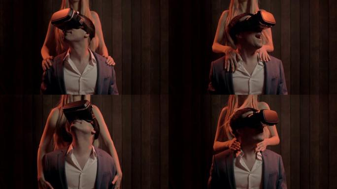 男人使用虚拟现实护目镜和观看3d女人