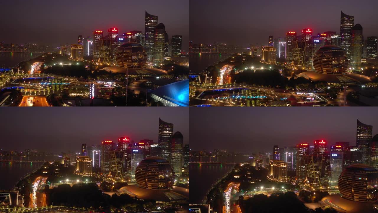 日落夜照明杭州市市区滨河交通湾空中全景4k中国
