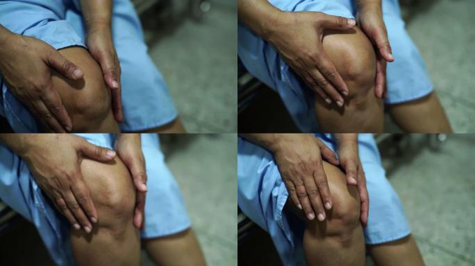 亚洲中年女性病人触摸和感觉疼痛她的膝盖: 健康的医学概念。