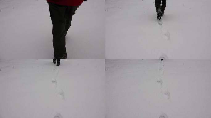 踏入雪地。4K。行走在雪上脚印