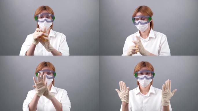 戴一次性手套的女药师戴着手套在手上喷洒防腐剂。