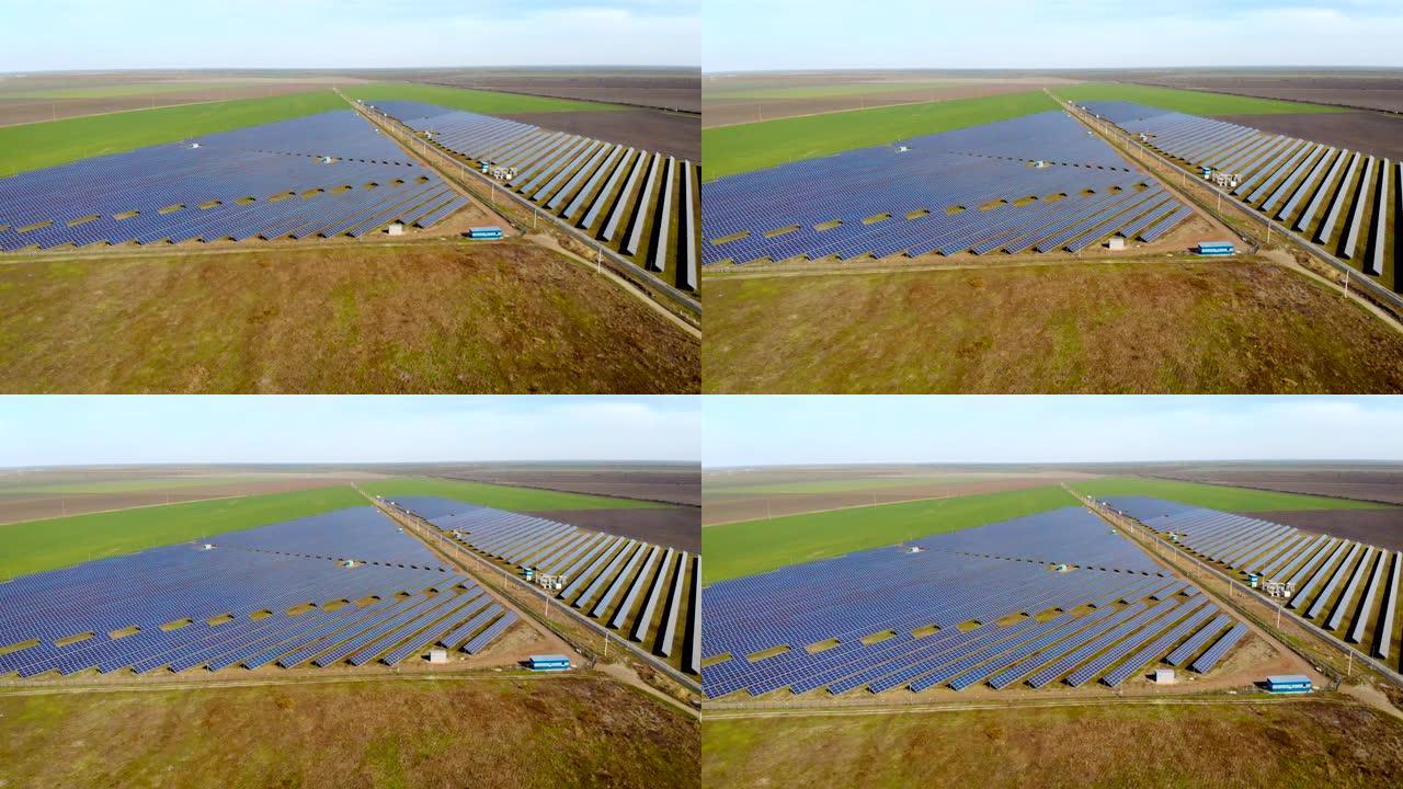 沿干旱农田的数百个太阳能模块或面板行的航拍镜头