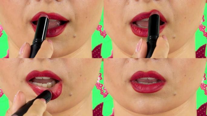 女孩用红色唇膏涂嘴唇。特写