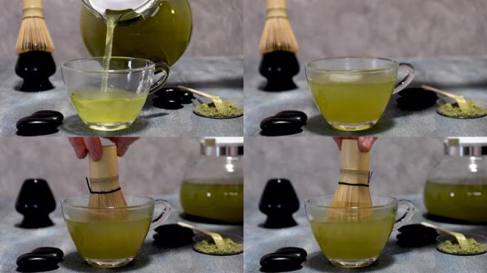玛卡绿茶从茶壶中倒入透明杯子中，并干扰了便宜货。