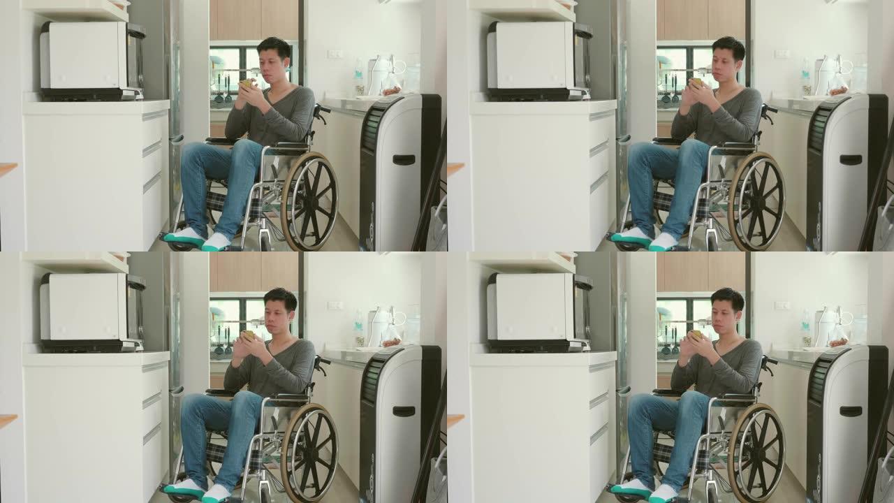 残疾人坐在轮椅上在家活动