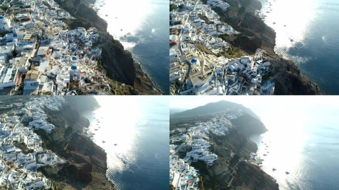 鸟瞰图飞越希腊圣托里尼岛的伊亚市