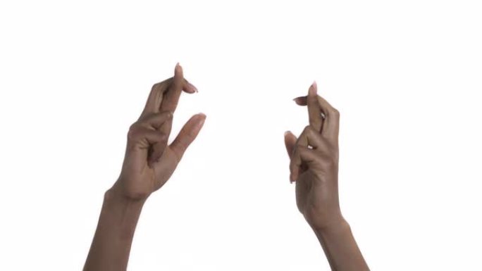 交叉手指的女人。孤立在白色背景上。两只手。