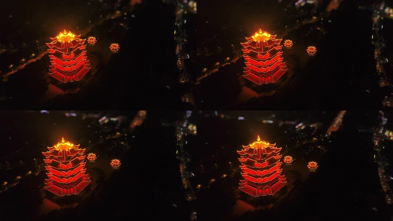 夜间照明武汉市著名黄鹤寺空中俯视图4k倾斜移位中国
