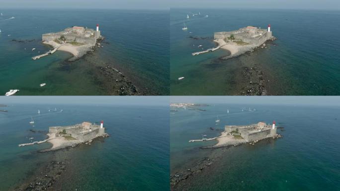 小岛上有一座灯塔的古老海上堡垒的空中全景