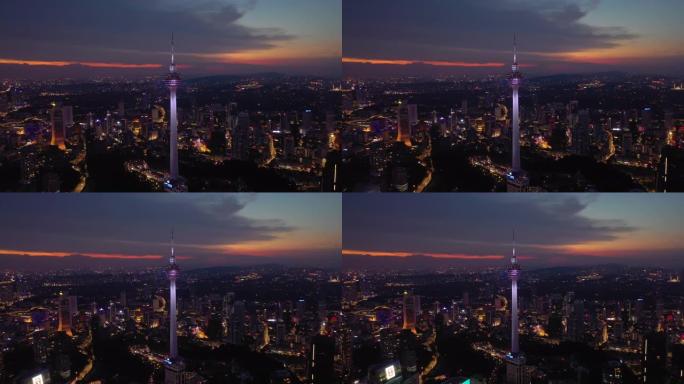 吉隆坡城市日落天空黄昏照明市中心电视塔空中全景4k马来西亚