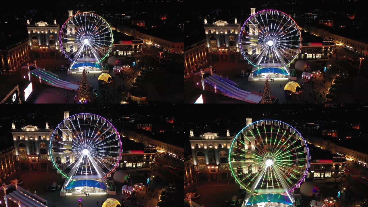 新年城市装饰着美丽的发光花环。空中射击。4k视频