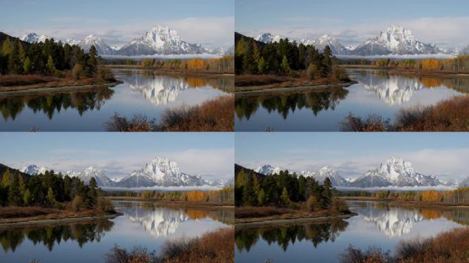 从oxbow bend可以看到大提顿国家公园莫兰山的秋季晨景