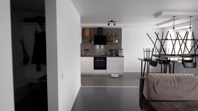一室公寓现代简约设计，机器人吸尘器，移动镜头
