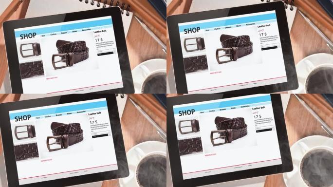 数字平板电脑屏幕上的在线零售店网站和木桌上的咖啡杯。