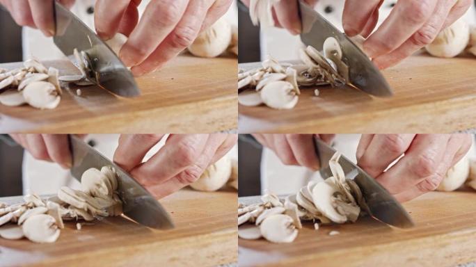 切分香菇的厨师刀的特写