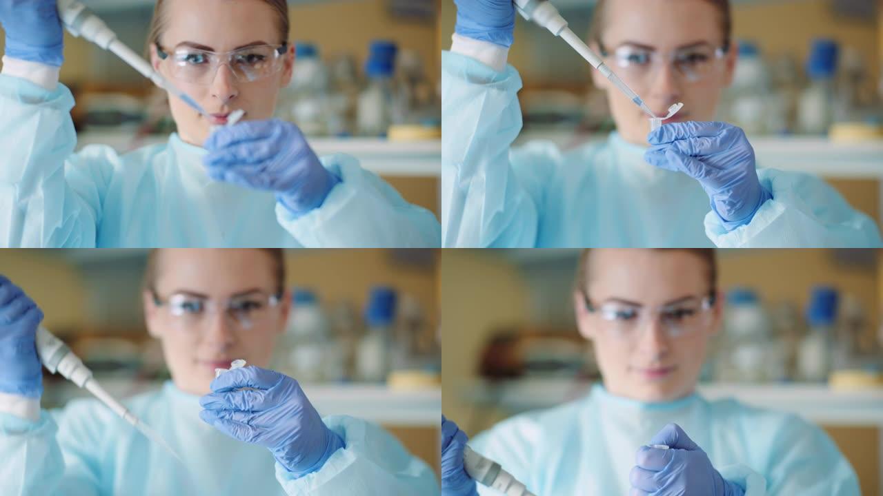 带移液器的女科学家在实验室分析液体