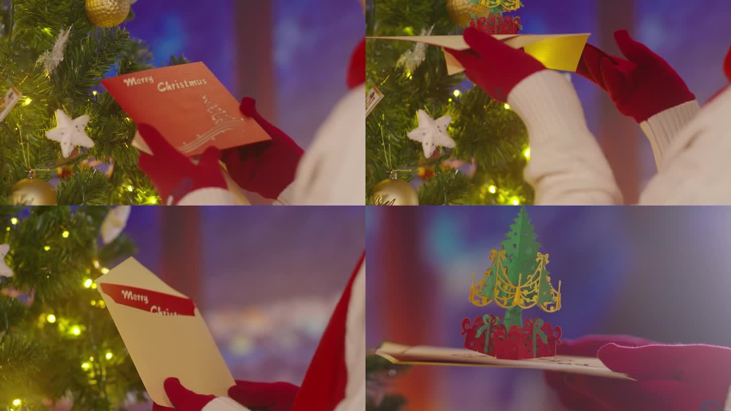 唯美欧美圣诞节氛围小孩打开圣诞树上的贺卡
