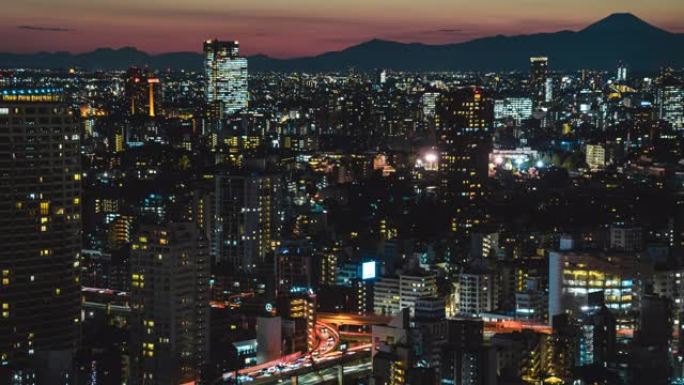 4k延时: 傍晚时分，从文京市民中心摩天大楼出发的东京城市景观minato主要道路和天际线的模糊运动