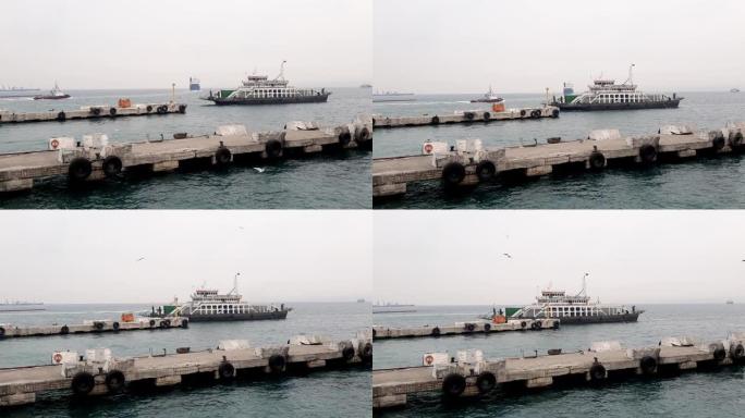 渡轮，接近码头的船，飞行的海鸥，马尔马拉海