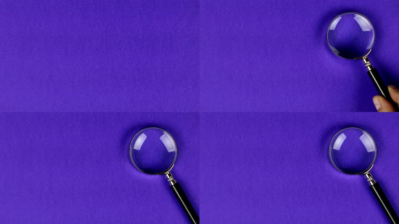 将放大镜放在紫色背景上显示搜索或调查