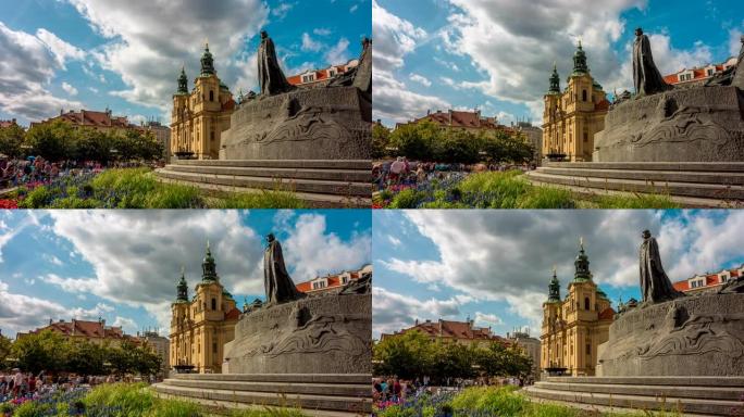 捷克共和国布拉格老城区中心1月胡斯纪念碑的游客行走和移动云的时间流逝
