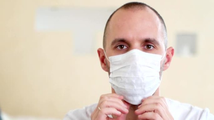 一个戴着医用口罩的病人的肖像。冠状病毒概念