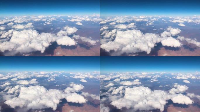 旅行时从窗户飞机看陆地和天空的空中和云景