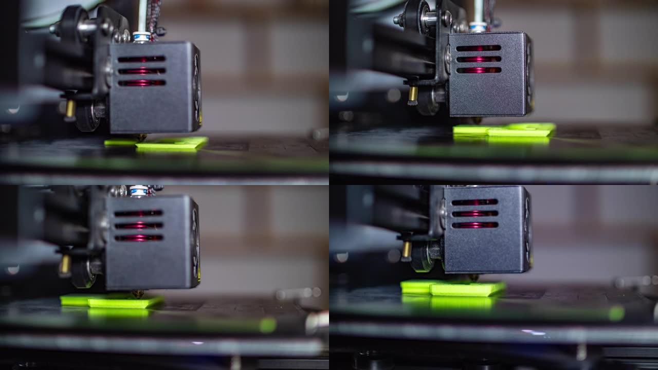 3D打印机打印绿色PLA塑料的特写镜头