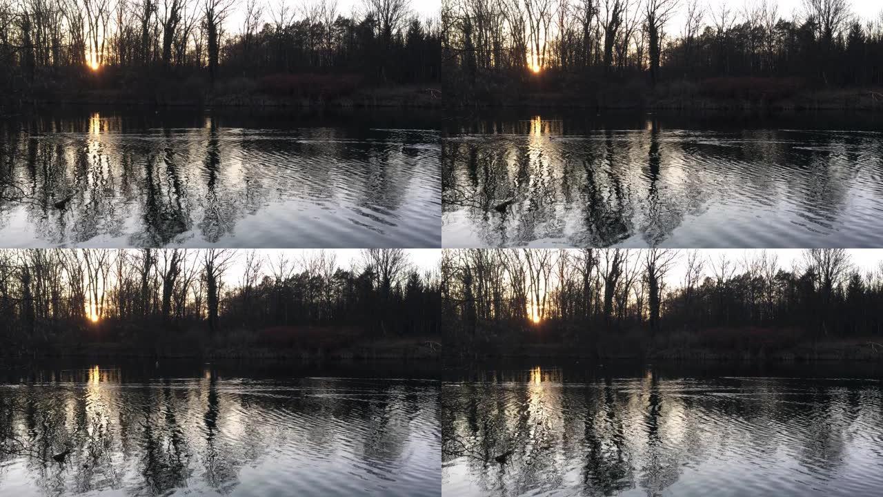 日落在缓慢漂浮的阿耳河。