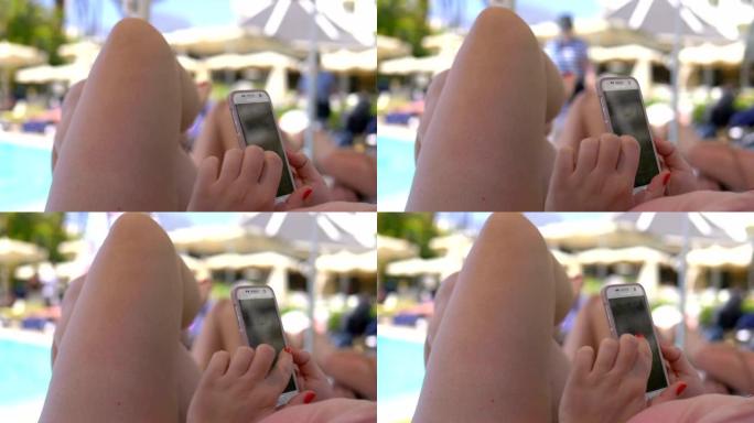 Woman using phone on the vacations in 4k slow moti