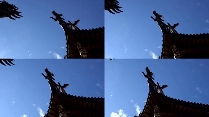 庙宇的屋顶。亚洲的龙石雕和古典建筑。龙像的剪影。