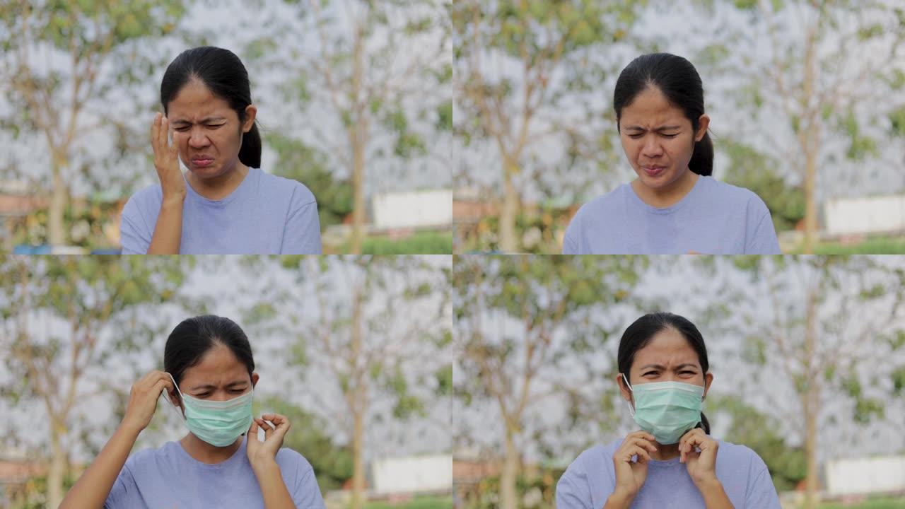 亚洲女性戴防护口罩防护病菌及空气污染，保健理念