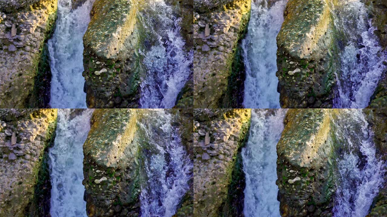 山区强劲的河流流动形成瀑布